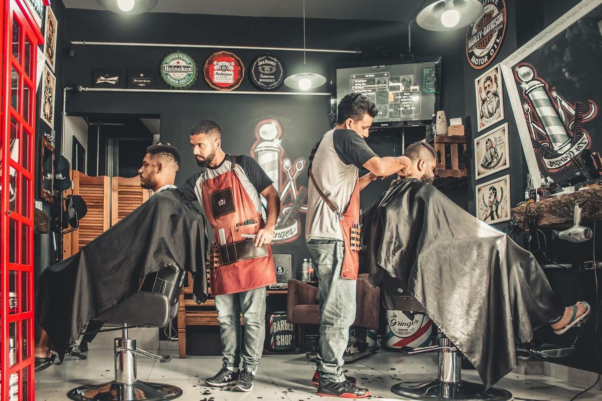 Inside the S and D barbershop with barbers at work